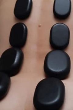 MASAJE CON PIEDRAS CALIENTS
